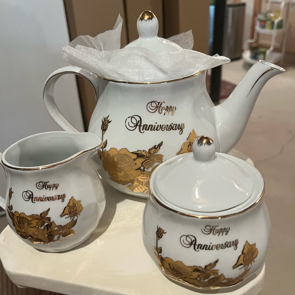 Elegant Gold and White Tea Set